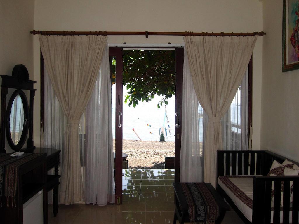 Galang Kangin Bungalows Амед Номер фото